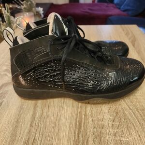 Nike Air Jordan 2011 in the Black/Dark Charcoal colorway.